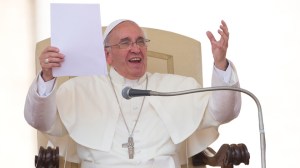 Pope Francis delivers his speech in St. Peter's square at the Vatican during his weekly general audience Wednesday, June 26, 2013.(AP Photo/Alessandra Tarantino)